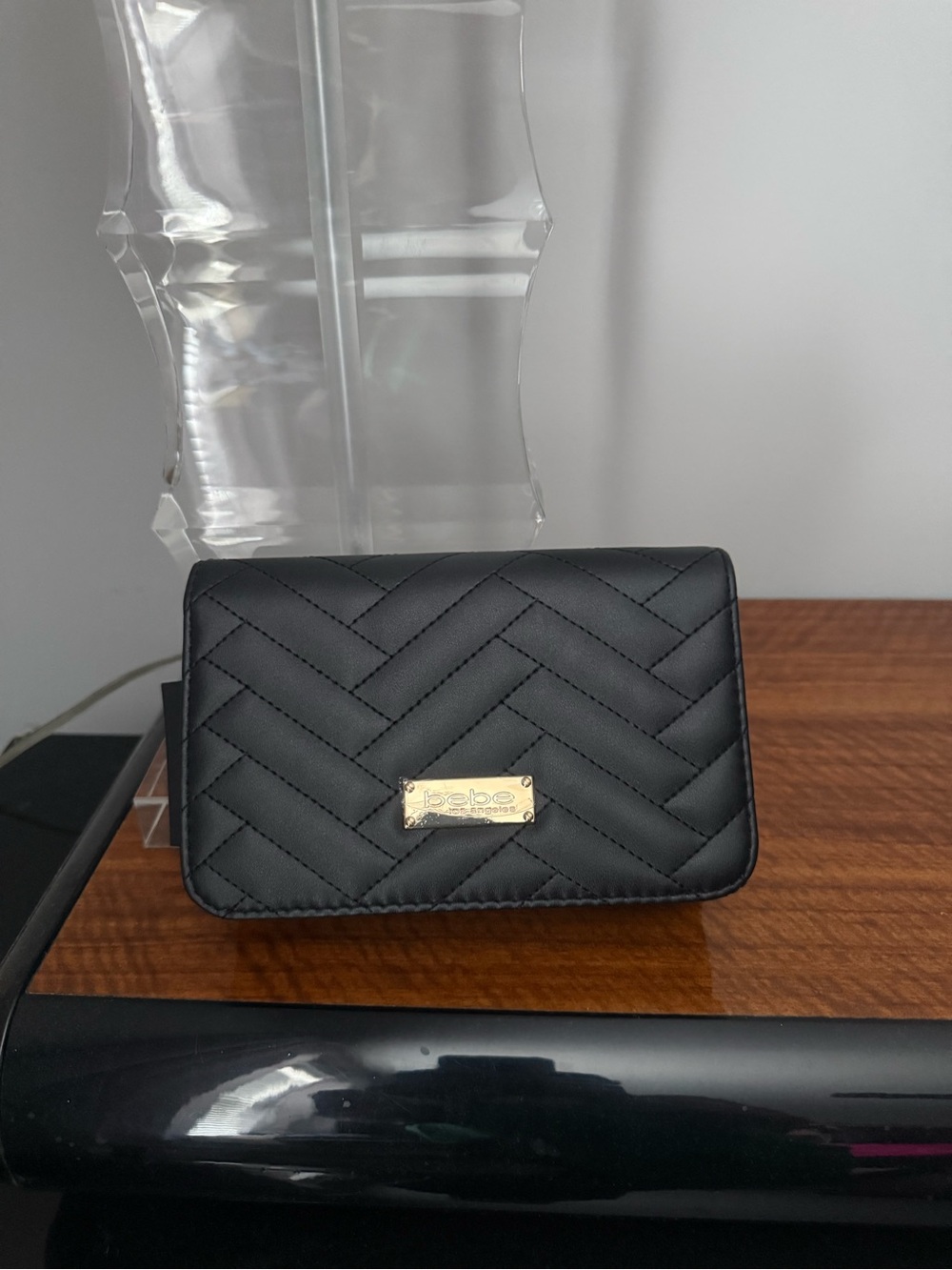 bebe Black Quilted Clutch with Gold Logo Plaque